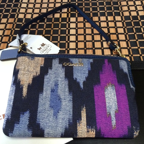 Authentic printed coach wristlet