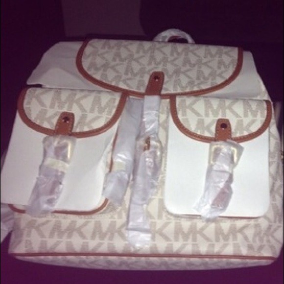 Authentic Michael Kors backpack and wallet