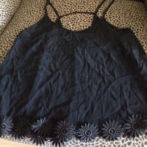 Black tank with open back and floral detail