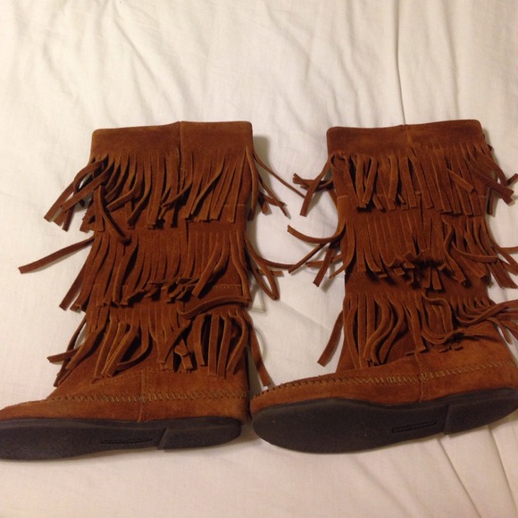 **on hold**Minnetonka size 6 fringe tall boots