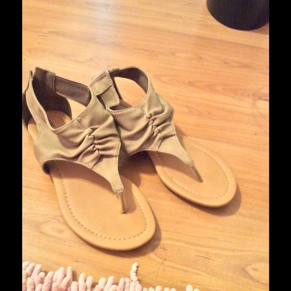 Tan flip flops