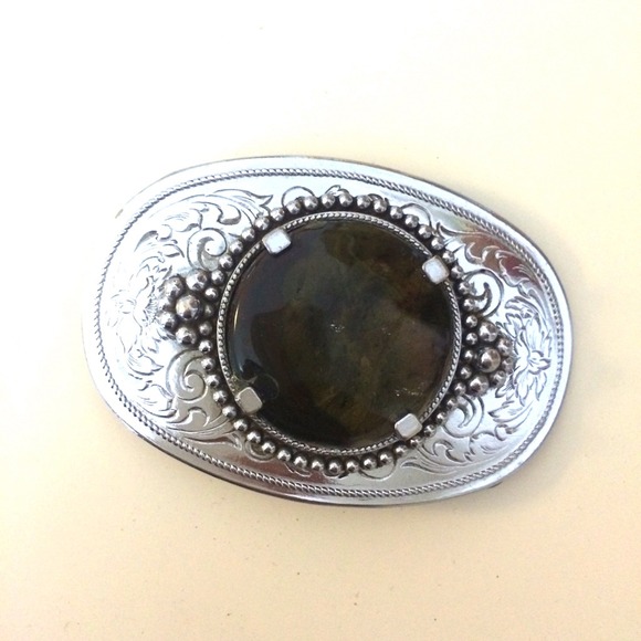 Silver belt buckle with olive green stone