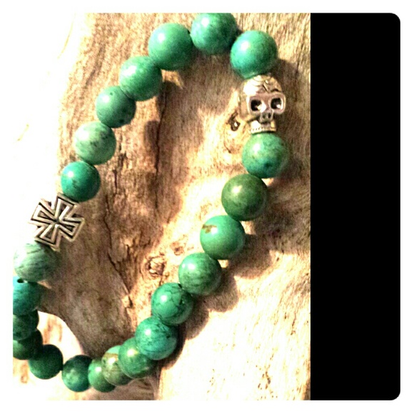 Stretch turquoise w/skull and Maltese skull