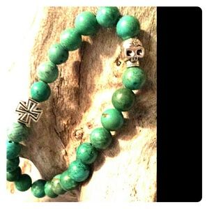Stretch turquoise w/skull and Maltese skull