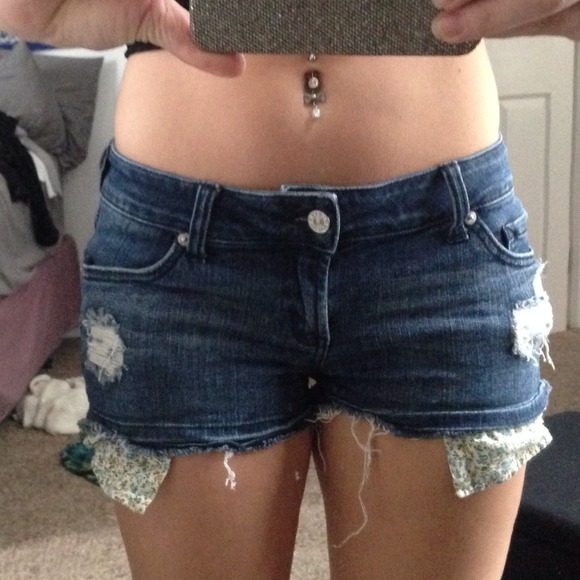Destroyed denim shorts