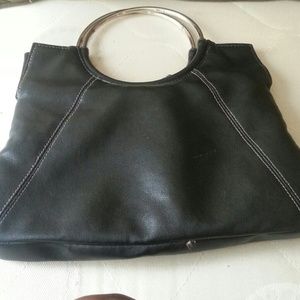 Black lether clutch bag with silver rings handles.