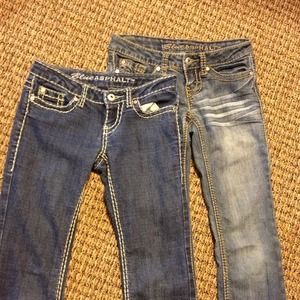 Two pairs of blue asphalt jeans