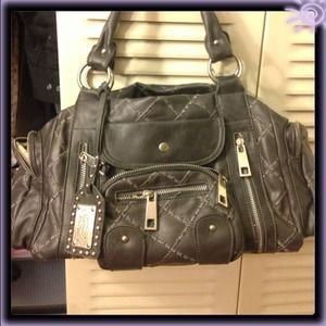 Grey purse with many pockets