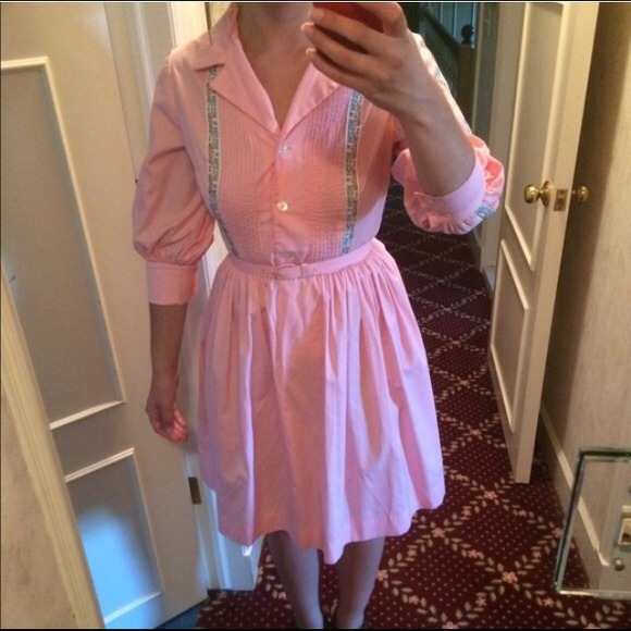 Pink vintage 50s style belted dress