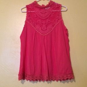 Laced, neck high shirt.