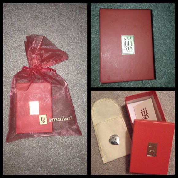 A James Avery heart charm with a cursive S
