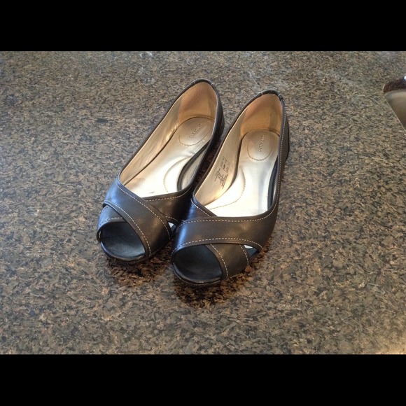 Black leather open toed flats