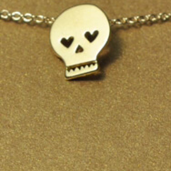 Dogeared gold dipped skull charm necklace