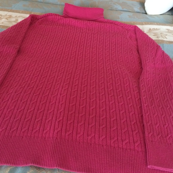 Pink turtleneck sweater