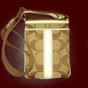 💯% COACH Legacy North/South Swingback