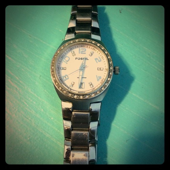 Silver fossil watch