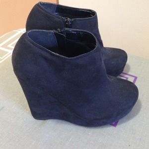 Black wedge booties