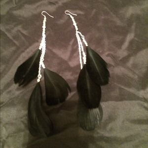 Long black feather earrings