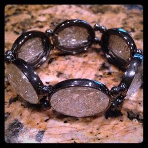 Gunmetal tone bracelet with glass gems