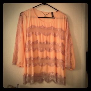 Pink and purple lace shirt and Aztec print shirt