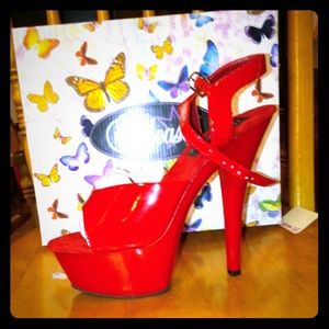 Red platform high heel shoes