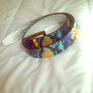 Bedazzled, snake skinned Guess belt