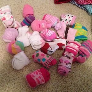 24 Pairs of toddler socks 9-18 months old.