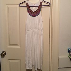 White cotton dress with bright beaded neckline