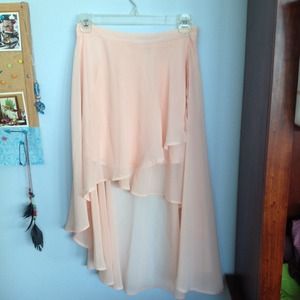 Pink Hi-Low Skirt, Necklace and Silver Bag.