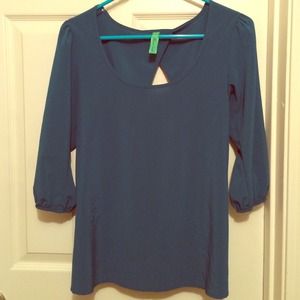 Green top with cut-out on the back