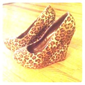 Leopard print wedge pumps