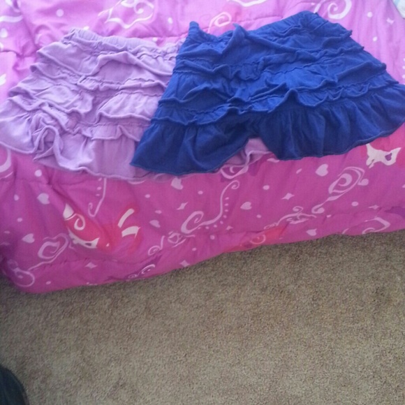 Pair of kids ruffle skirts