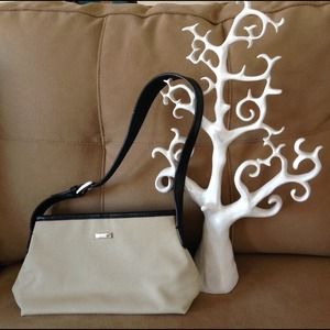 Beige canvas purse with faux leather details
