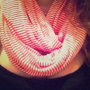 Red and white stripped scarf.