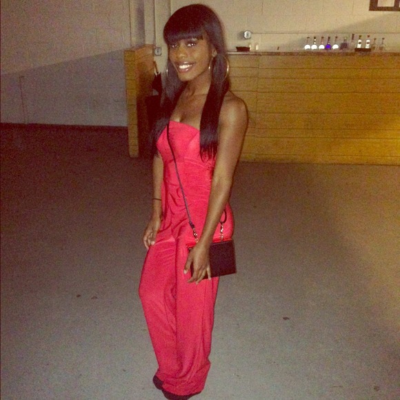 Selling a red one-piece jumpsuit.