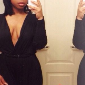 Black Jump Suit W/Plunging Neckline Sz. L Worn 1x