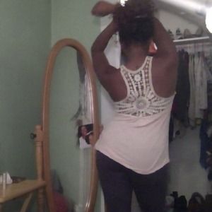 Peach and white striped shirt with a crochet back