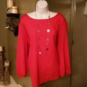 Tangerine colored 3/4 inch sleeve top