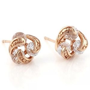 Gold tone three stoned earrings