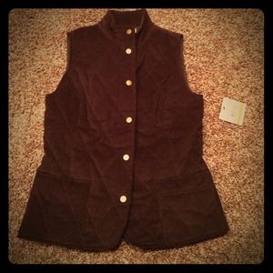 Chocolate colored button up vest. Never worn