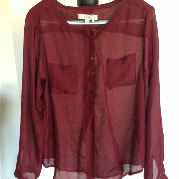 Burgundy or maroon long sleeved sheer top