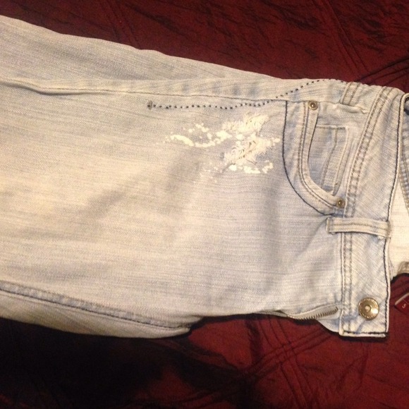 Light blue destroyed denim
