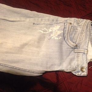 Light blue destroyed denim