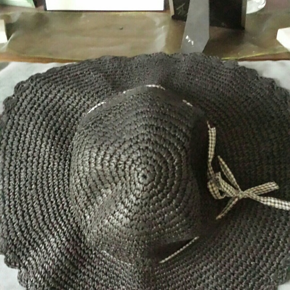 Black floppy hat, keep sun off your face