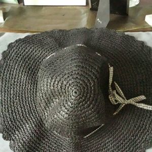 Black floppy hat, keep sun off your face