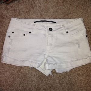 White distressed jean shorts