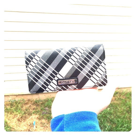 Authentic Calvin Klein continental button wallet