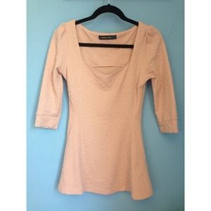 Fit-and-flare Heart Neck Top - Pink
 $21.00 USD