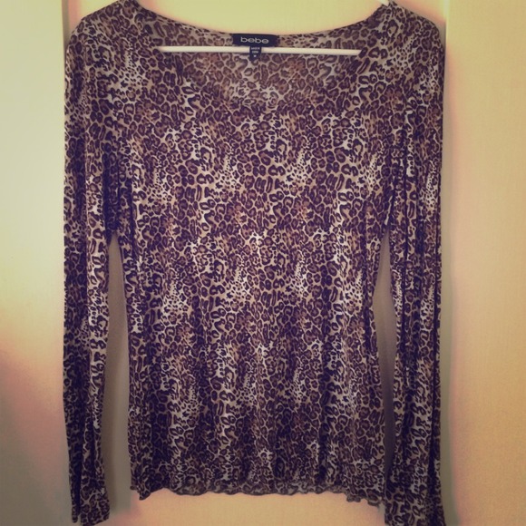 Bebe lovely in leopard top