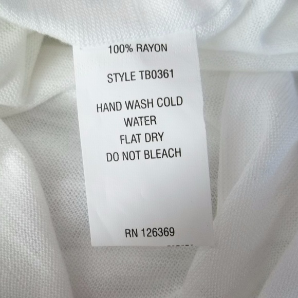 White sheer knit top with flutter sleeves. New - Picture 6 of 6